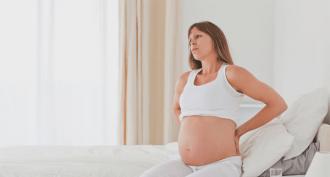 Боли в копчике при беременности: почему и что делать?